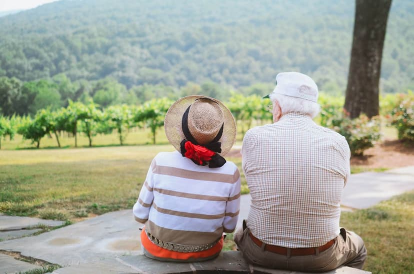 Elderly couple looking at their estate after a lifetime of building generational wealth