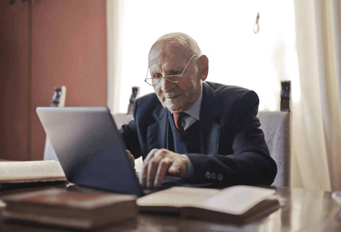 Elderly man researching asset ownership